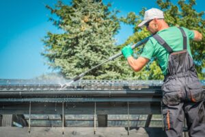 Roof and Gutters Power Cleaning Using Pressure Washer