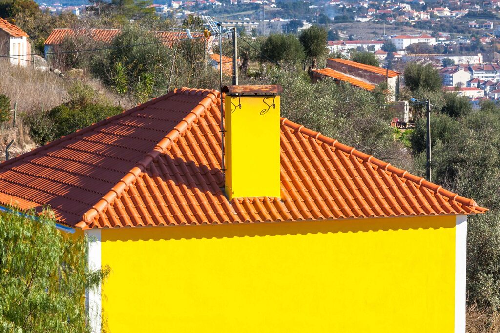 exterior bright yellow house