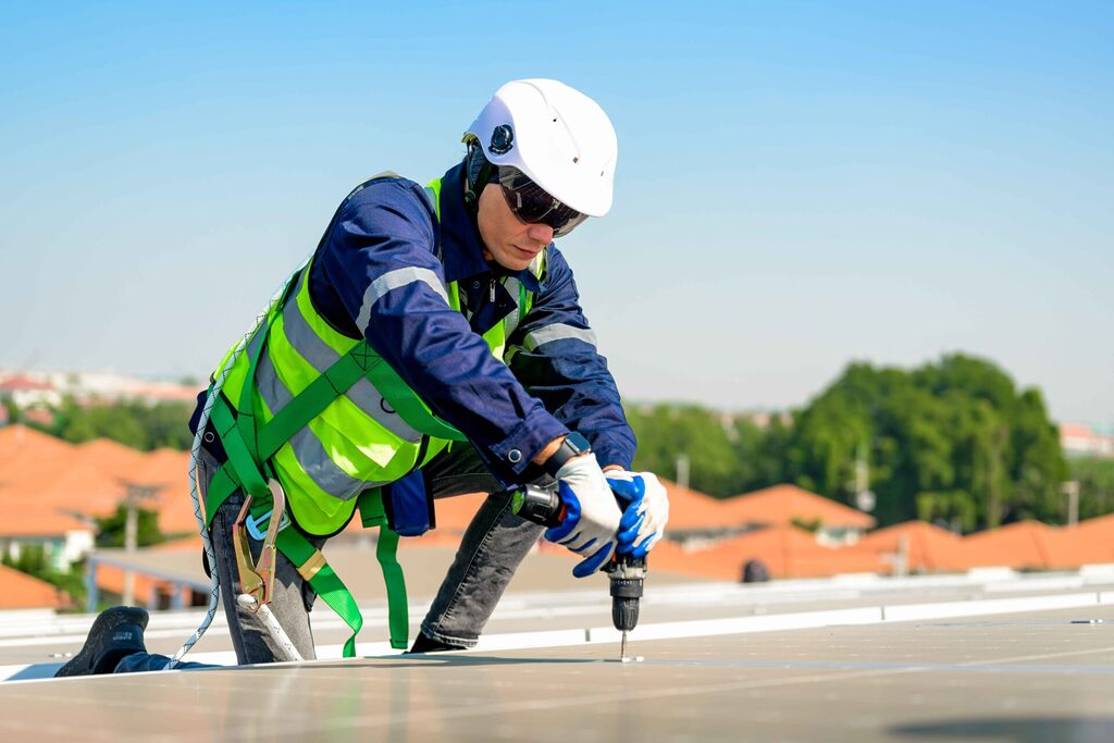 professional roofer working with helmet