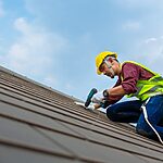 man fixing the roof