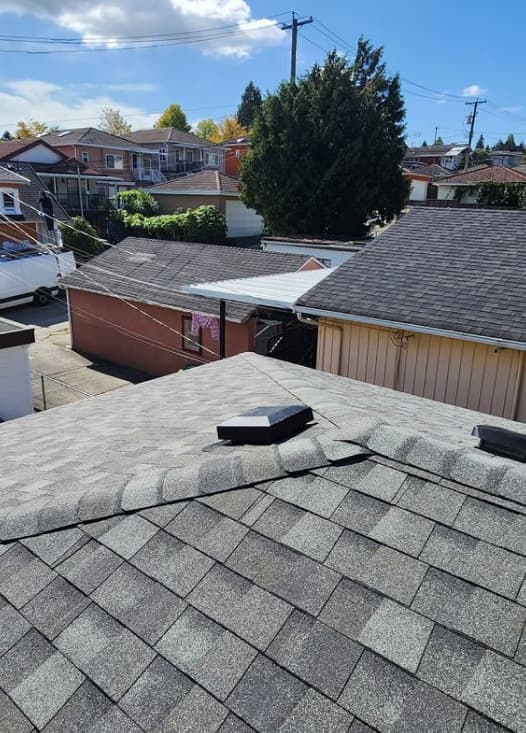 Strategic vent and exhaust placement on a pitched Vancouver roof — All Coast Roofing