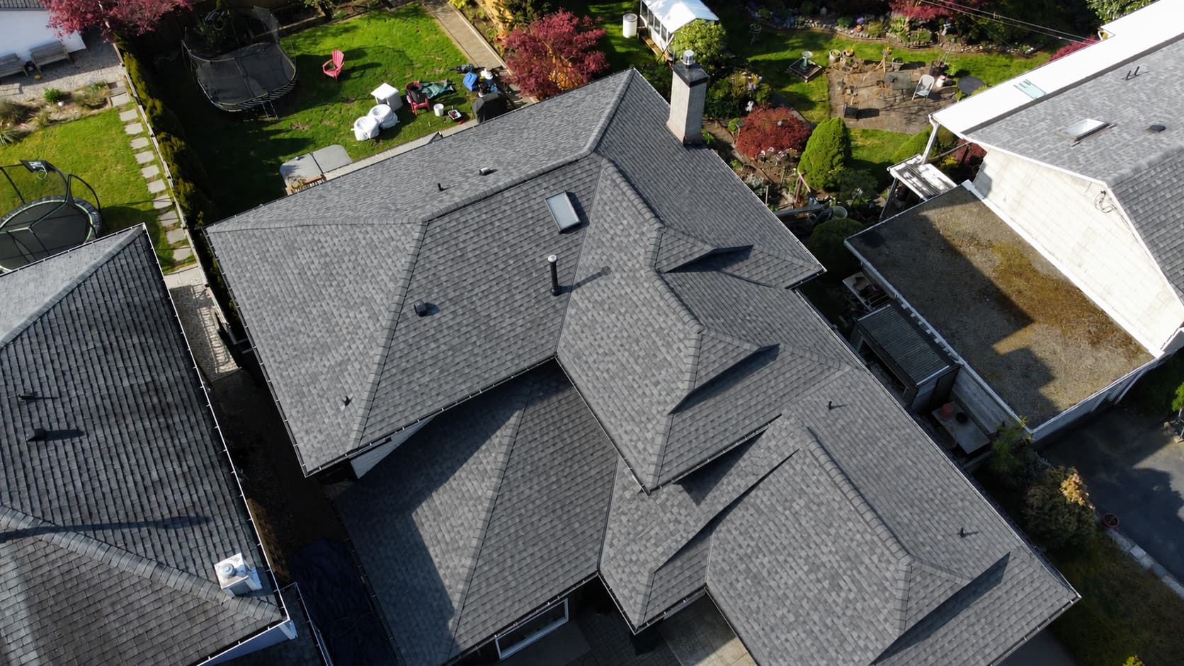 Roof after upgrade — completed pitched roof with new shingles